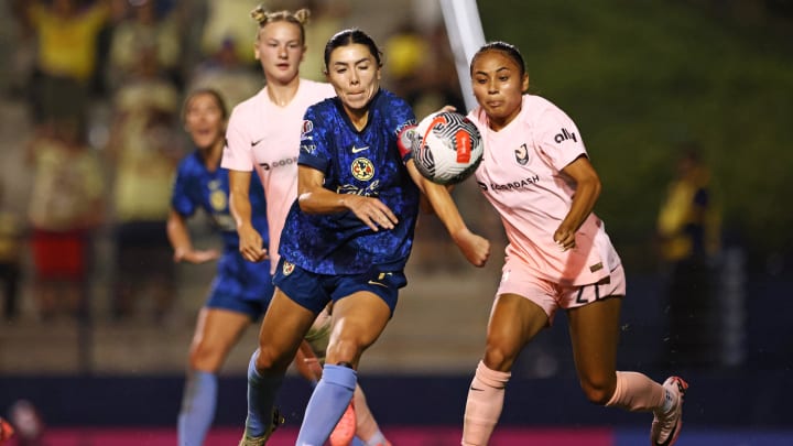 Jul 20, 2024; Fullerton, CA, USA; Tijuana midfielder Paolo Villamizar (7) and Angel City FC midfielder Alyssa Thompson (21) race for the ball during the first half at Titan Stadium. Mandatory Credit: Jessica Alcheh-USA TODAY Sports