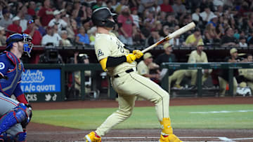 Sep 10, 2024; Phoenix, Arizona, USA; Arizona Diamondbacks designated hitter Joc Pederson (3) hits a solo home run against the Texas Rangers in the first inning at Chase Field. Mandatory Credit: Rick Scuteri-Imagn Images
