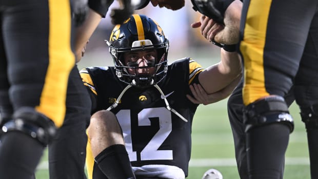 Iowa Hawkeyes quarterback Cade McNamara (12) 