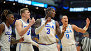 Mar 20, 2025; Lexington, KY, USA;  UCLA Bruins guard Eric Dailey Jr. (3) reacts during the second half against the Utah State Aggies in the first round of the NCAA Tournament at Rupp Arena. Mandatory Credit: Aaron Doster-Imagn Images