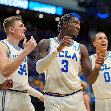 Mar 20, 2025; Lexington, KY, USA;  UCLA Bruins guard Eric Dailey Jr. (3) reacts during the second half against the Utah State Aggies in the first round of the NCAA Tournament at Rupp Arena. Mandatory Credit: Aaron Doster-Imagn Images