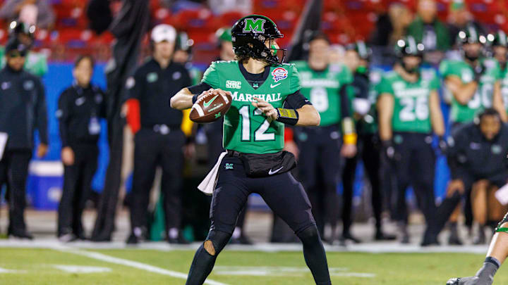 Dec 19, 2023; Frisco, TX, USA; Marshall Thundering Herd quarterback Cole Pennington (12) during the first quarter against the UTSA Roadrunners at Toyota Stadium. Mandatory Credit: Andrew Dieb-Imagn Images