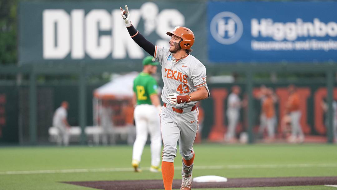 Texas Longhorns outfielder Aiden Robbins celebrates while rounding the bases after hitting a home run in the Austin Super Regional.