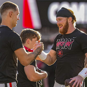 Oct 7, 2023; Athens, Georgia, USA; Georgia Bulldogs quarterbacks Carson Beck (15) and quarterback Brock Vandagriff (12) react on the field prior to the game against the Kentucky Wildcats at Sanford Stadium. Mandatory Credit: Dale Zanine-Imagn Images