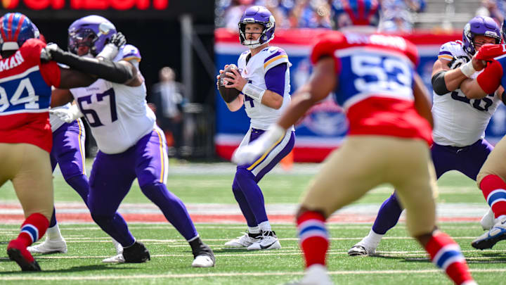 Sep 8, 2024; East Rutherford, New Jersey, USA; Minnesota Vikings quarterback Sam Darnold (14) looks to pass the ball against the New York Giants during the first half at MetLife Stadium. Mandatory Credit: John Jones-Imagn Images