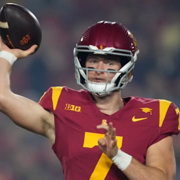 USC quarterback Miller Moss throws a pass during a game.