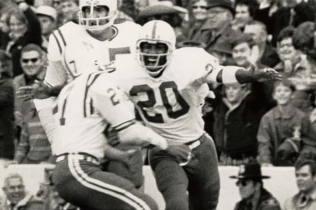 Johnny Rodgers celebrates after his punt return gave Nebraska na early lead in the Game of the Century.