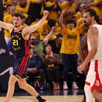 Apr 28, 2025; San Francisco, California, USA; Golden State Warriors center Quinten Post (21) after scoring a basket against the Houston Rockets during the second quarter of game four of the 2025 NBA Playoffs first round at Chase Center. Mandatory Credit: Kelley L Cox-Imagn Images
