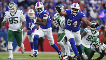 Dec 29, 2024; Orchard Park, New York, USA; Buffalo Bills wide receiver Tyrell Shavers (80) runs with the ball after making a catch and scores a touchdown against the New York Jets during the second half at Highmark Stadium.
