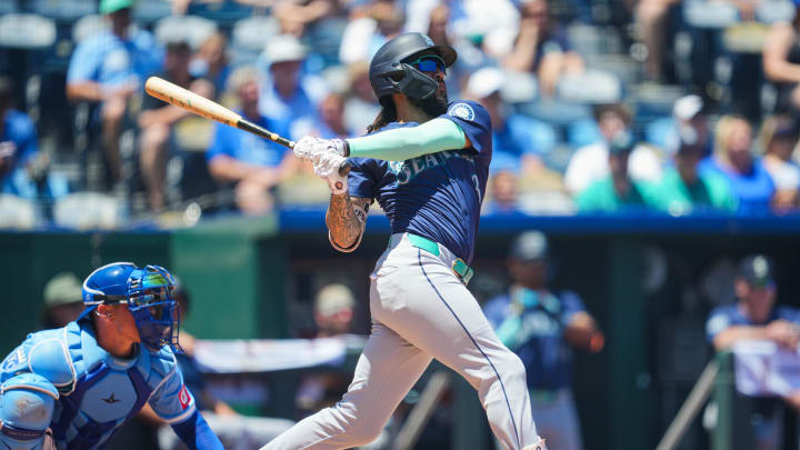 Seattle Mariners shortstop J.P. Crawford (3) hits a home run during the first inning against the Kansas City Royals at Kauffman Stadium on June 9.
