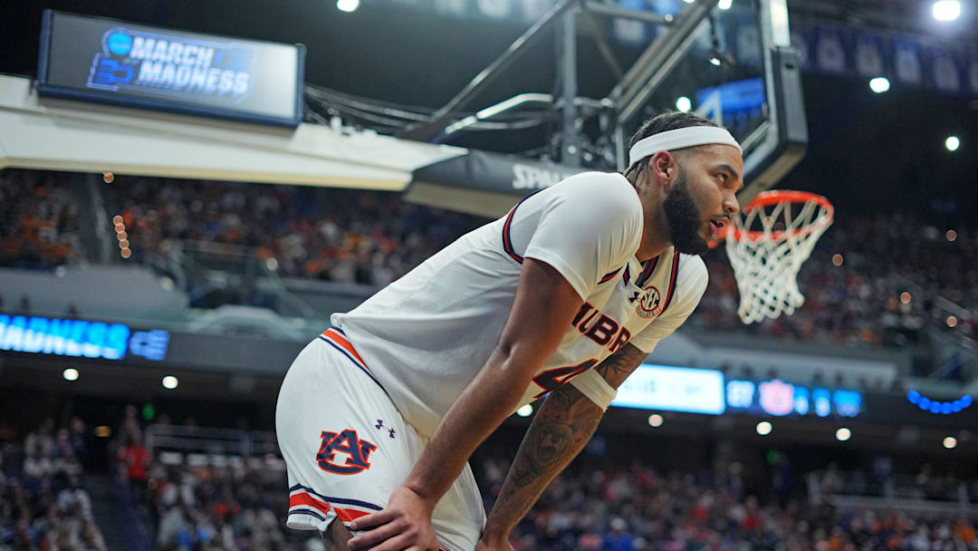 Mar 22, 2025; Lexington, KY, USA;  Auburn Tigers forward Johni Broome (4) reacts during the first half against the Creighton Bluejays in the second round to the NCAA Tournament at Rupp Arena. Mandatory Credit: Aaron Doster-Imagn Images