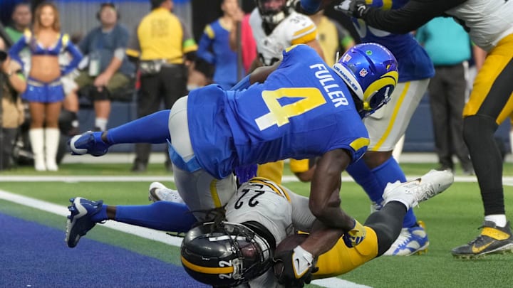 Los Angeles Rams safety Jordan Fuller attempts to stop Pittsburgh Steelers running back Najee Harris from scoring a touchdown. Los Angeles Rams safety Jordan Fuller attempts to stop Pittsburgh Steelers running back Najee Harris from scoring a touchdown.