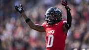 Oct 11, 2025; Cincinnati, Ohio, USA; Cincinnati Bearcats cornerback Matthew McDoom (0) reacts during a stop in play against the UCF Knights in the second half at Nippert Stadium. Mandatory Credit: Aaron Doster-Imagn Images