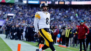 Dec 7, 2025; Baltimore, Maryland, USA; Pittsburgh Steelers quarterback Aaron Rodgers (8) reacts after scoring a touchdown against the Baltimore Ravens during the first half at M&T Bank Stadium. Mandatory Credit: Peter Casey-Imagn Images