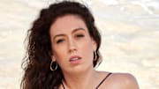 Breanna Stewart was photographed by Laretta Houston in St. Thomas. Swimsuit by SKATIE. Earrings by SOKO.