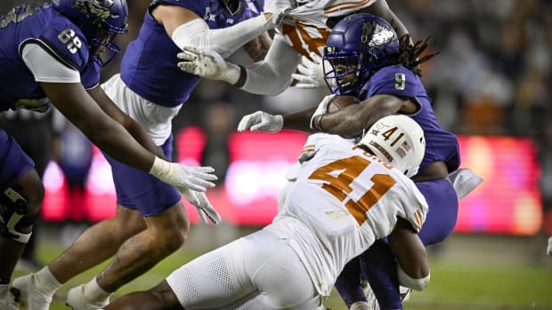 Texas Longhorns linebacker Jaylan Ford (41) makes a stop against the TCU Horned Frogs  