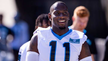 Jul 23, 2025; Charlotte, NC, USA; Carolina Panthers rookie linebacker Nic Scourton (11) walks to the field for Panthers Training Camp. Mandatory Credit: Scott Kinser-Imagn Images