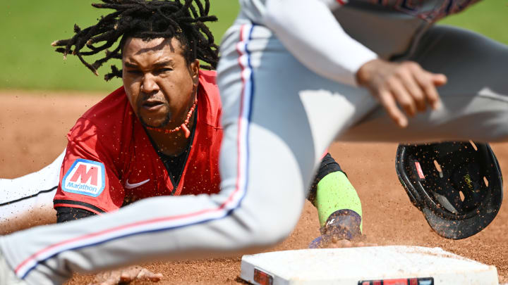 Aug 25, 2024; Cleveland, Ohio, USA; Cleveland Guardians third baseman Jose Ramirez (11) steals third base during the third inning against the Texas Rangers at Progressive Field. Mandatory Credit: Ken Blaze-USA TODAY Sports