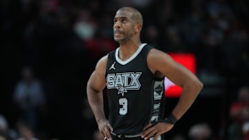 Apr 6, 2025; Portland, Oregon, USA; San Antonio Spurs point guard Chris Paul (3) looks on during the first half against the Portland Trail Blazers at Moda Center. Mandatory Credit: Soobum Im-Imagn Images