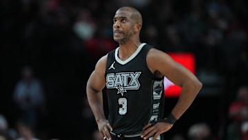 Apr 6, 2025; Portland, Oregon, USA; San Antonio Spurs point guard Chris Paul (3) looks on during the first half against the Portland Trail Blazers at Moda Center. Mandatory Credit: Soobum Im-Imagn Images