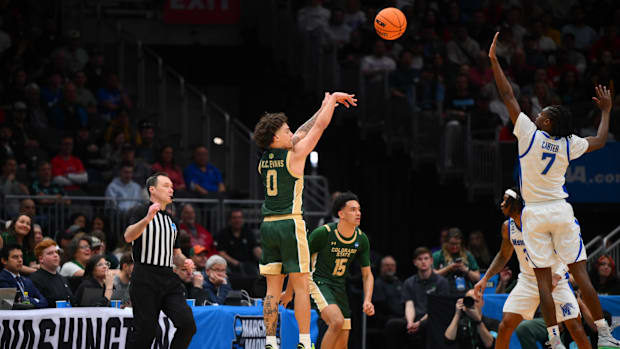 Mar 21, 2025; Seattle, WA, USA; Colorado State Rams guard Kyan Evans (0) shoots a three pointer over Memphis Tigers guard