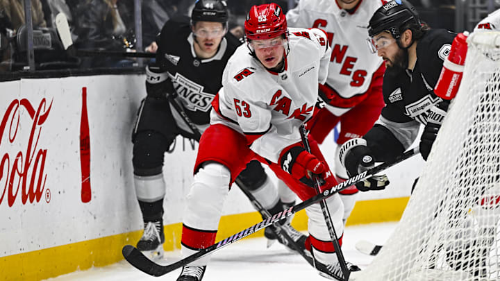 Mar 22, 2025; Los Angeles, California, USA; Carolina Hurricanes right wing Jackson Blake (53) fights for the puck against Los Angeles Kings defenseman Drew Doughty (8) during the first period at Crypto.com Arena. Mandatory Credit: Jonathan Hui-Imagn Images Mar 22, 2025; Los Angeles, California, USA; Carolina Hurricanes right wing Jackson Blake (53) fights for the puck against Los Angeles Kings defenseman Drew Doughty (8) during the first period at Crypto.com Arena. Mandatory Credit: Jonathan Hui-Imagn Images