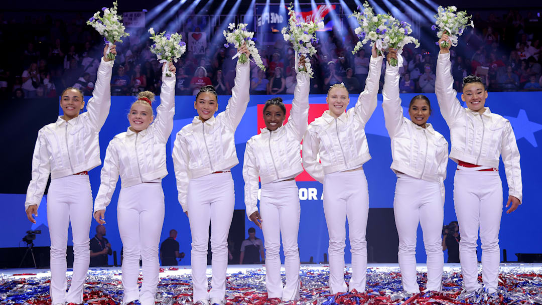 Joscelyn Roberson (second from left) and Leanne Wong (first on right) alongside the 2024 US Women's Artistic Gymnastics Olympic team at Olympic Trials