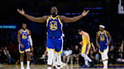 Oct 21, 2025; Los Angeles, California, USA; Golden State Warriors forward Draymond Green (23) reacts during the first half against the Los Angeles Lakers at Crypto.com Arena. Mandatory Credit: William Liang-Imagn Images