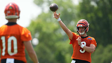 Jun 10, 2025; Cincinnati, OH, USA; Cincinnati Bengals quarterback Joe Burrow (9) throws to quarterback Payton Thorne (10) during practice at Paycor Stadium. Mandatory Credit: Kareem Elgazzar-Imagn Images