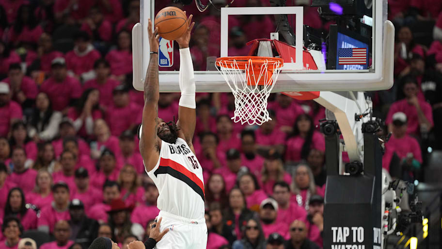 Portland Trail Blazers center Robert Williams III converts an alley-oop for a dunk.