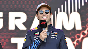 Oct 19, 2024; Austin, Texas, USA; Oracle Red Bull Racing driver Sergio Perez (11) of Team Mexico speaks to the crowd during a fan forum before the Sprint Race in the 2024 Formula One US Grand Prix at Circuit of the Americas. Mandatory Credit: Jerome Miron-Imagn Images