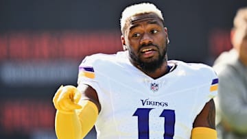 Minnesota Vikings cornerback NaJee Thompson warms up before a game against the Chicago Bears at Soldier Field in Chicago on Oct. 15, 2023.