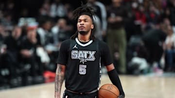 Apr 6, 2025; Portland, Oregon, USA; San Antonio Spurs guard Stephon Castle (5) prepares to shoot a free throw during the first half against the Portland Trail Blazers at Moda Center. Mandatory Credit: Soobum Im-Imagn Images