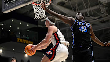 Fouss contests an acrobatic layup against Ole Miss