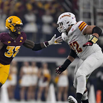 Dec 7, 2024; Arlington, TX, USA; Arizona State Sun Devils defensive lineman Prince Dorbah (32) and Iowa State Cyclones offensive lineman Jalen Travis (72) in action during the game between the Iowa State Cyclones and the Arizona State Sun Devils at AT&T Stadium. Mandatory Credit: Jerome Miron-Imagn Images