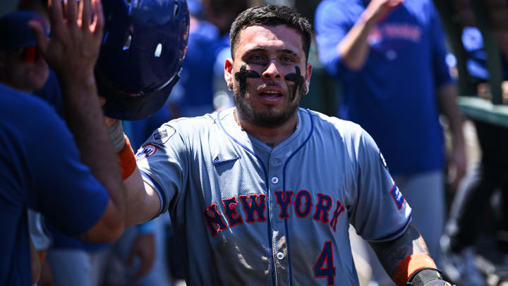 Aug 4, 2024; Anaheim, California, USA; New York Mets catcher Francisco Alvarez (4) celebrates with teammates after scoring against the Los Angeles Angels during the second inning at Angel Stadium. Mandatory Credit: Jonathan Hui-USA TODAY Sports