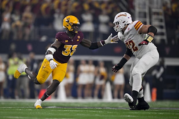 Iowa State Cyclones offensive lineman Jalen Travis (72) blocks Arizona State Sun Devils defensive lineman Prince Dorbah (32).
