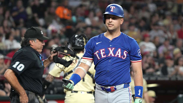 Nathaniel Lowe was 0 for 3 with a walk and had three of the Texas Rangers 13 strikeouts against the Arizona Diamondbacks.