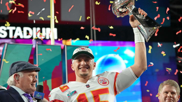 Feb 12, 2023; Glendale, Arizona, US; Kansas City Chiefs quarterback Patrick Mahomes (15) holds the Vince Lombardi Trophy after winning Super Bowl LVII against the Philadelphia Eagles at State Farm Stadium. Mandatory Credit: Kirby Lee-USA TODAY Sports