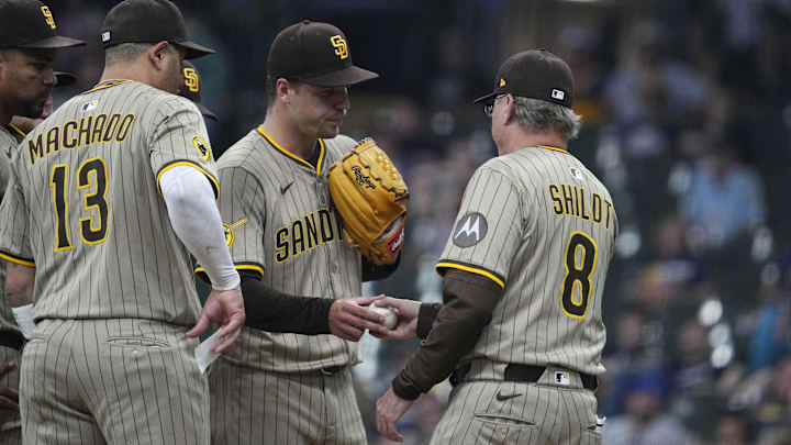 Jun 8, 2025; Milwaukee, Wisconsin, USA; San Diego Padres manager Mike Shildt (8) takes starting pitcher San Diego Padres pitcher Ryan Bergert (38) out of the game against the Milwaukee Brewers at American Family Field. Mandatory Credit: Michael McLoone-Imagn Images Jun 8, 2025; Milwaukee, Wisconsin, USA; San Diego Padres manager Mike Shildt (8) takes starting pitcher San Diego Padres pitcher Ryan Bergert (38) out of the game against the Milwaukee Brewers at American Family Field. Mandatory Credit: Michael McLoone-Imagn Images