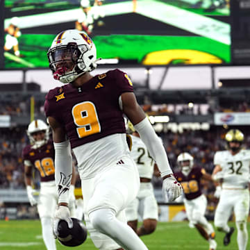 Nov 9, 2024; Tempe, Arizona, USA; Arizona State Sun Devils defensive back Montana Warren (9) returns a blocked punt for a touchdown against the UCF Knights during the first half at Mountain America Stadium, Home of the ASU Sun Devils. Mandatory Credit: Joe Camporeale-Imagn Images