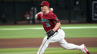 Arizona Diamondbacks pitcher Paul Sewald (38) pitches against the Pittsburgh Pirates during the ninth inning at Chase Field