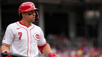 Cincinnati Reds designated hitter Spencer Steer (7) returns to the dugout