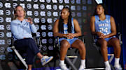 North Carolina head coacgh Courtney Banghart with players Reniya Kelly and Indya Nivar at the ACC Tipoff on Monday, Oct. 6, 2025.
