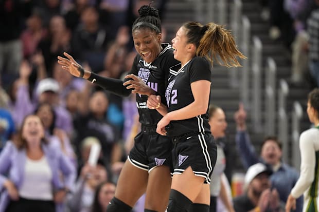 Golden State Valkyries center Temi Fagbenle celebrates with guard Kaitlyn Chen. 