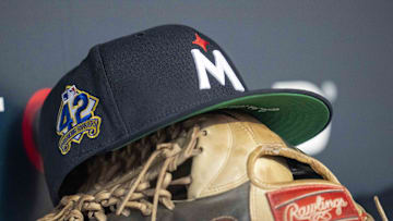 Apr 15, 2025; Minneapolis, Minnesota, USA; A general view of a Minnesota Twins hat with a Jackie Robinson logo stitched on the side of it against the New York Mets in the fourth inning at Target Field. All players wore #42 for Jackie Robinson Day Mandatory Credit: Jesse Johnson-Imagn Images
