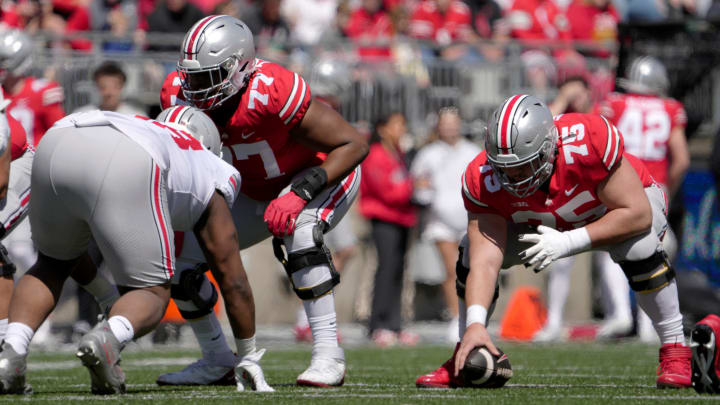 April 13, 2024; Columbus, Ohio, USA; 
Ohio State Buckeyes offensive linemen Tegra Tshabola (77) and Carson Hinzman (75) compete during the first half of the LifeSports spring football game at Ohio Stadium on Saturday.