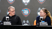 Apr 4, 2024; Cleveland, OH, USA; UConn Huskies coach Geno Auriemma (left) and guard Paige Bueckers during press conference at Rocket Mortgage FieldHouse. Mandatory Credit: Kirby Lee-Imagn Images