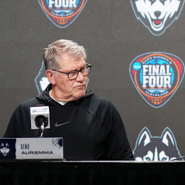 Apr 4, 2024; Cleveland, OH, USA; UConn Huskies coach Geno Auriemma (left) and guard Paige Bueckers during press conference at Rocket Mortgage FieldHouse. Mandatory Credit: Kirby Lee-Imagn Images