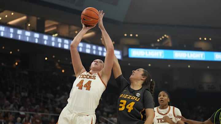 Jan 30, 2025; Austin, Texas, USA; Texas Longhorns forward Taylor Jones (44) shoots while defended by Missouri Tigers forward Hannah Linthacum (34) during the first half at Moody Center. Mandatory Credit: Scott Wachter-Imagn Imagesl Jan 30, 2025; Austin, Texas, USA; Texas Longhorns forward Taylor Jones (44) shoots while defended by Missouri Tigers forward Hannah Linthacum (34) during the first half at Moody Center. Mandatory Credit: Scott Wachter-Imagn Imagesl
